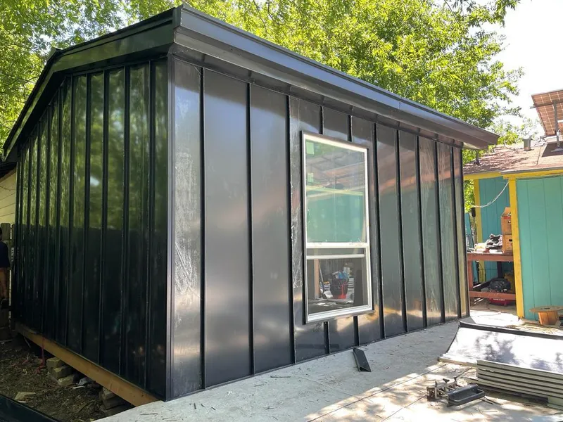 Black standing seam metal wall panels for Roof Inspection in Stockton